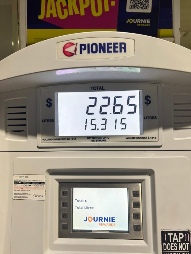 Picture1 - Toronto Bangla Town | Digital Bangla Weekly Magazine Gas pump display showing total .65 and 15.315 L of fuel, with Pioneer branding and Journie Rewards on screen and pump.