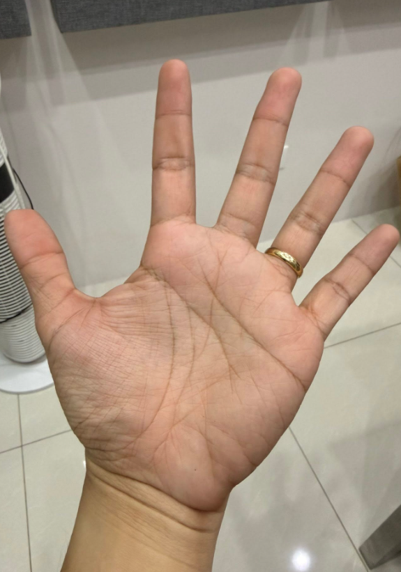 Picture5 - Toronto Bangla Town | Digital Bangla Weekly Magazine Open palm facing the camera with fingers spread; wearing a gold ring on the ring finger.